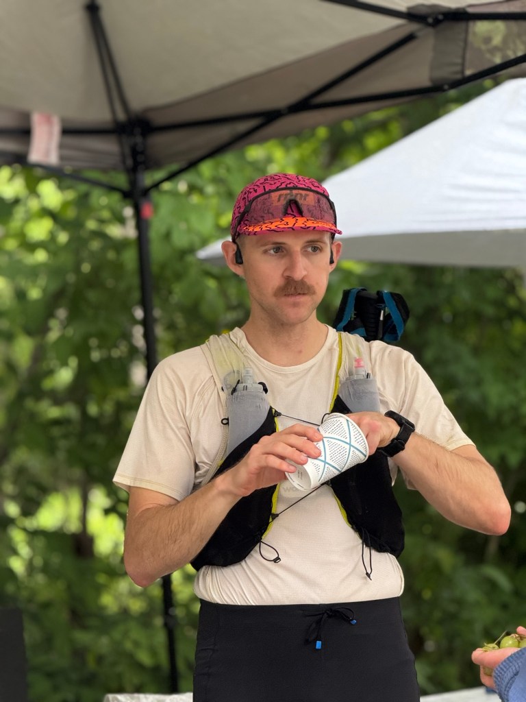 Patrick munching on some goodies before leaving the Habron Gap aid station.